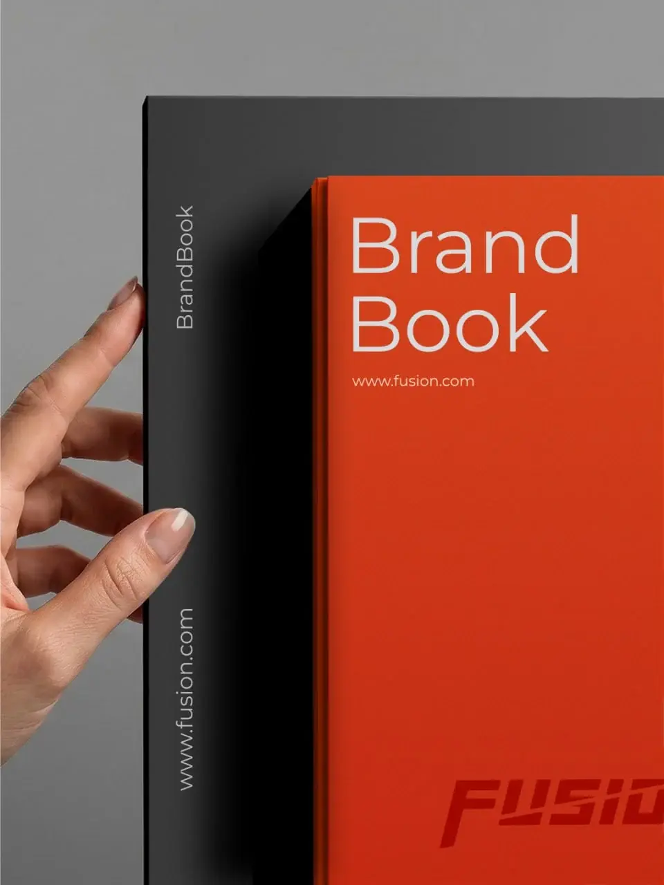 Orange Fusion brand book cover inside a charcoal case