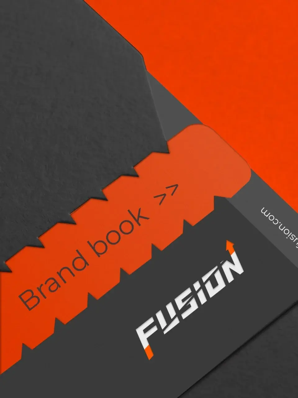 Die-cut orange brand book sleeve with the Fusion logotype
