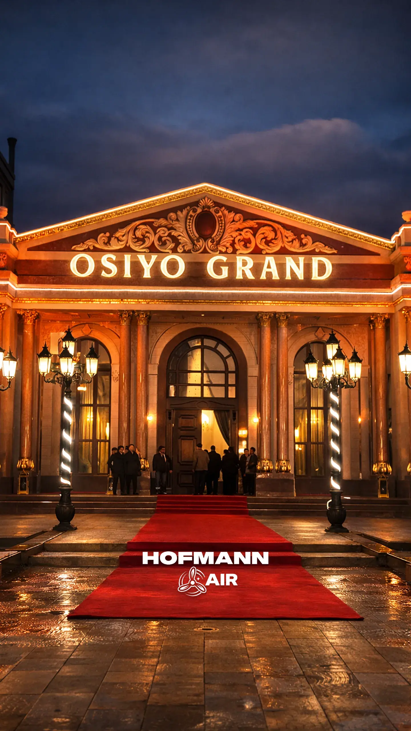 Illuminated banquet hall entrance at night with the Hofmann Air logo