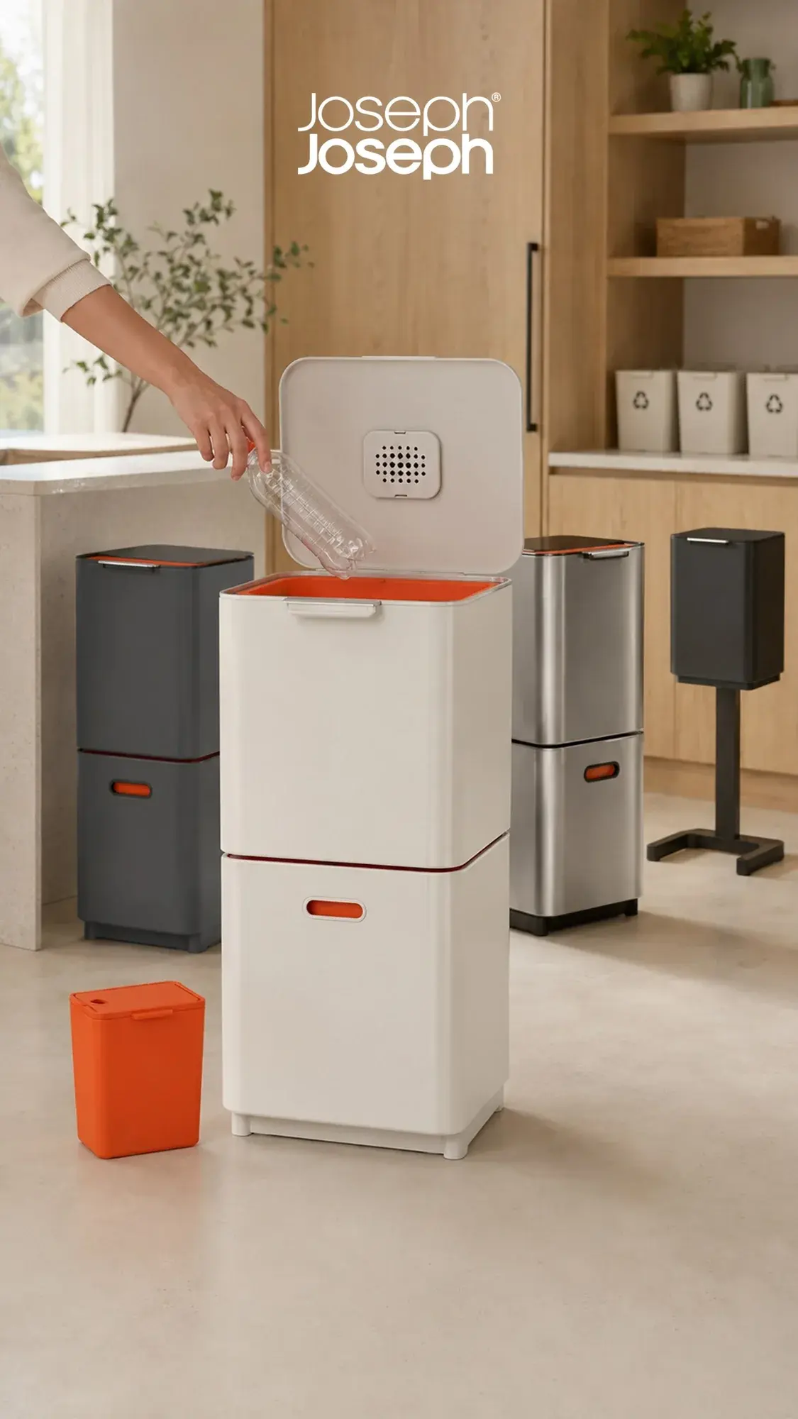 Joseph Joseph Totem recycling bins in stone, graphite and steel in an oak kitchen